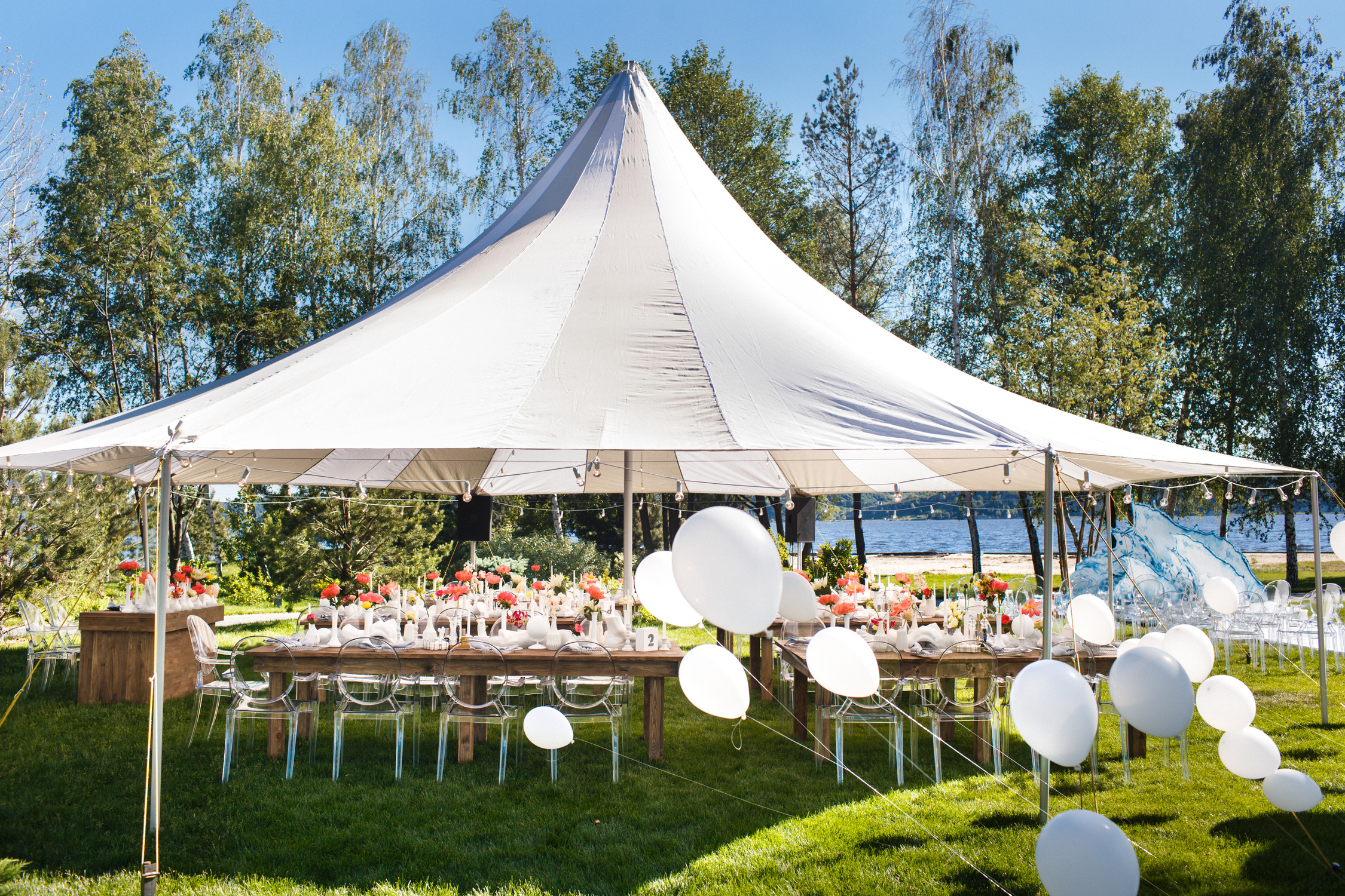 Wedding tent with large balls. Tables sets for wedding